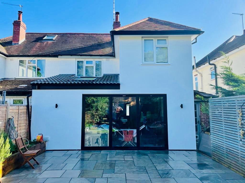 Silicone rendering and EWI project in Warwickshire with a finished white exterior.