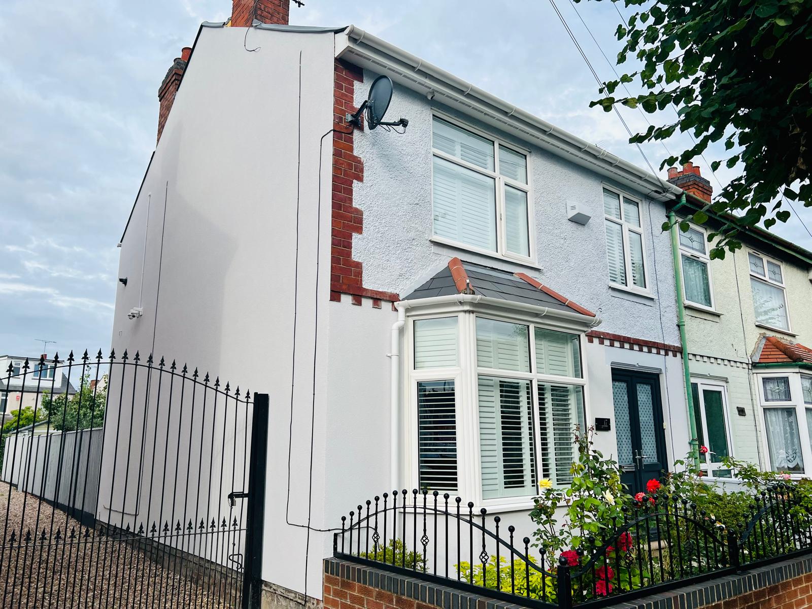 Silicone rendering and EWI project in Warwickshire on a side elevation.